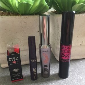 Lots of 3 designer mascara and a mini lipstick